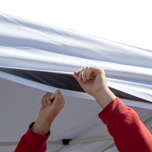 Canopy liner valances adhere to canopy valances with hook-and-loop fastener to provide a professional look