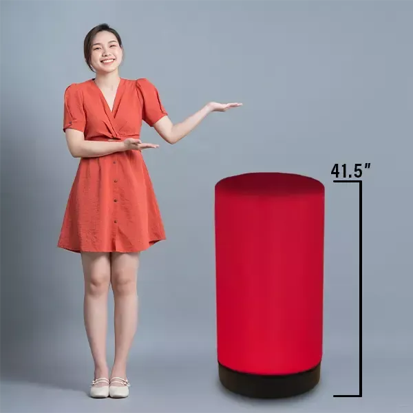 A lady standing next to the 41.5" table