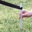 Webbing gets placed around stake Webbing gets placed around stake