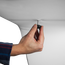 Adjustable bracket attaches to display with hand-tightening knob that is obscured from obvious view. Adjustable bracket attaches to display with hand-tightening knob that is obscured from obvious view.